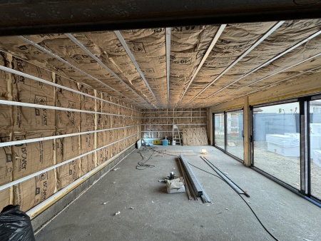 Isolation-thermique-dune-extension-en-ossature-bois-interieur-et-exterieur.jpg